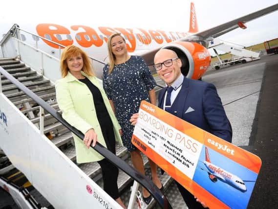 Ali Gayward, easyJet's UK commercial manager, Sophie Dekker, easyJet's UK commercial director, and Leon McQuaid, Newcastle airport's development manager, launch the new flights